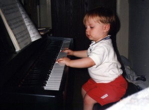 Man Child playing one of his first "compositions"